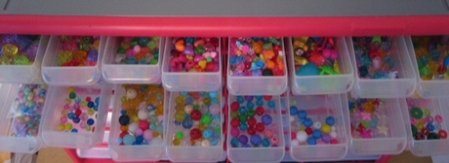 Colorful beads sorted by shape